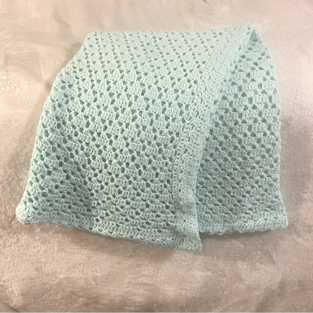 Crocheted baby blanket.
